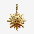 Vintage gold plated stamped sun charm